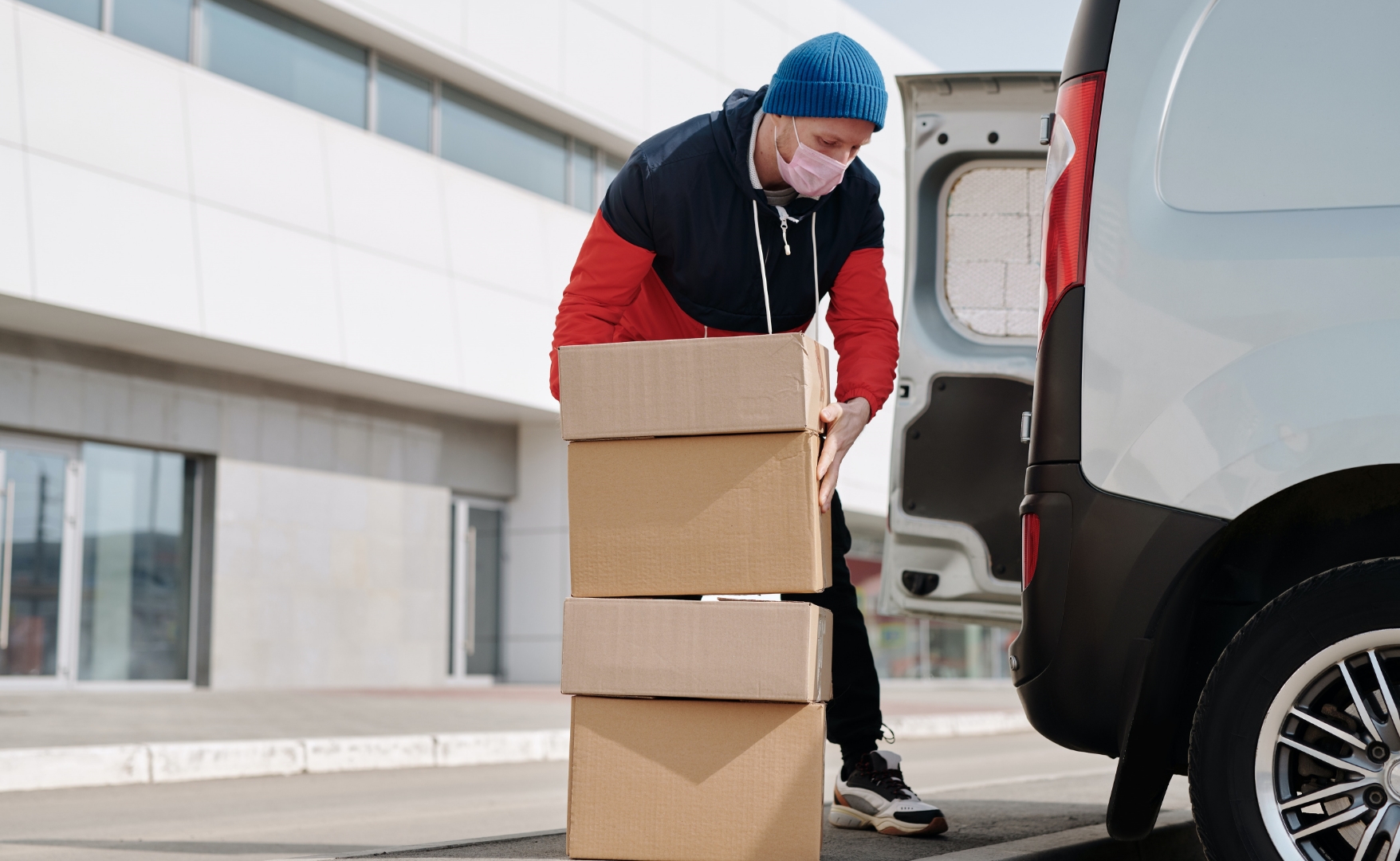 a man lifting a package